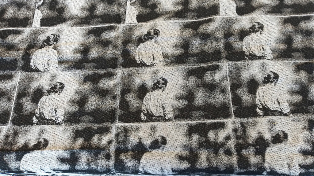 A series of woven "cells" shows the back of a person walking. At each cell, the subject is positioned slightly differently within the frame. 